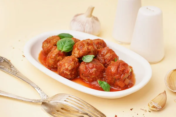 Plate Tasty Meat Balls Tomato Sauce Basil Beige Background — Stock Photo, Image