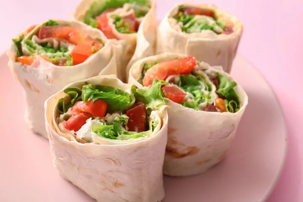 Plate Tasty Lavash Rolls Tomatoes Greens Pink Background — Stock Photo, Image