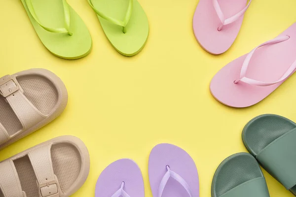 Frame Made Different Color Flip Flops Yellow Background — Stock Photo, Image