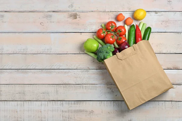 Paper Bag Fresh Vegetables Fruits Light Wooden Background — Stock Photo, Image