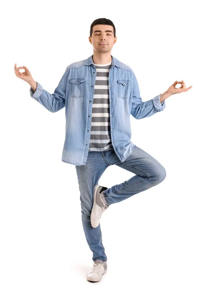 Junger Mann Meditiert Auf Weißem Hintergrund Gleichgewichtskonzept — Stockfoto