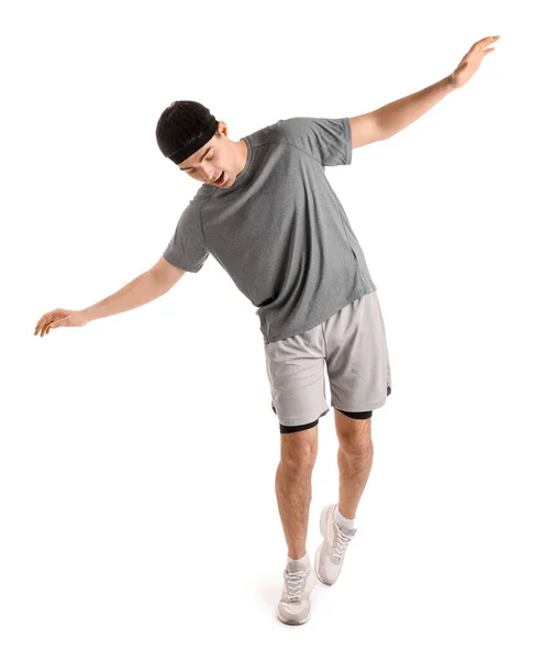 Sportowy Młody Człowiek Balansujący Białym Tle — Zdjęcie stockowe