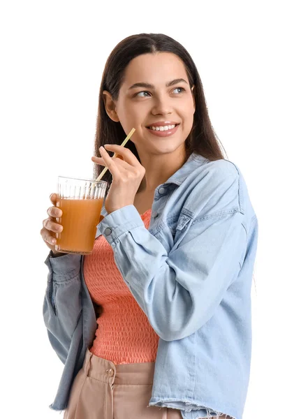 stock image Young woman with glass of vegetable juice on white background