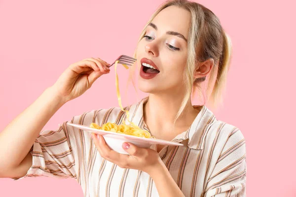 Young Woman Eating Tasty Pasta Pink Background Closeup — Stock Photo, Image