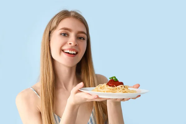Young Woman Tasty Pasta Blue Background Closeup — Stock Photo, Image