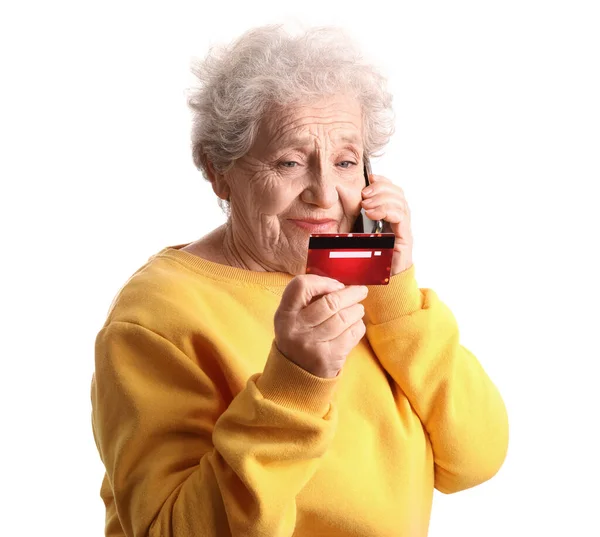 Senior Woman Credit Card Talking Mobile Phone White Background Stock Image