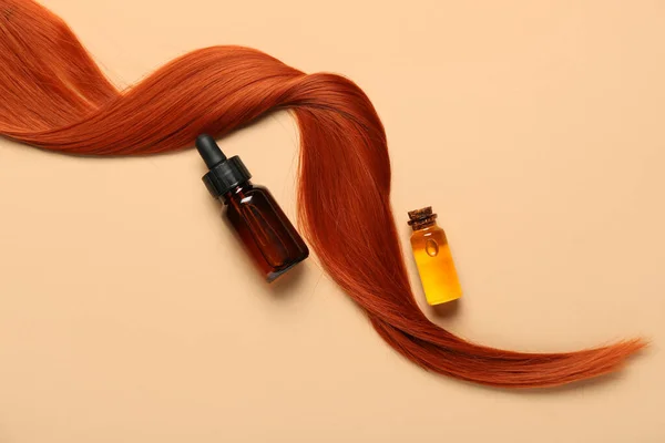 Ginger Hair Strand Bottles Essential Oil Color Background Closeup — Stock Photo, Image