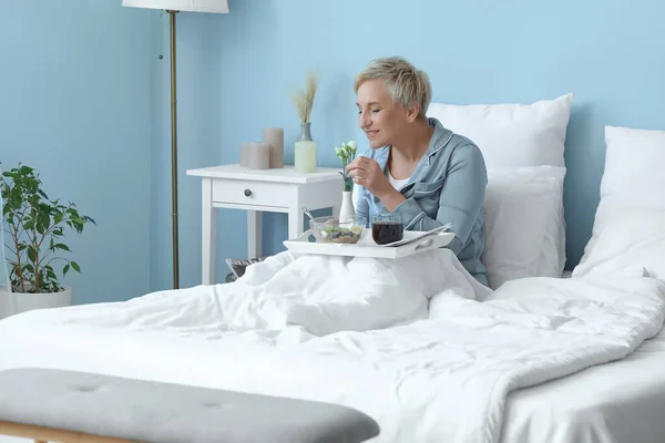 Mature Woman Having Breakfast Bed — Stock Photo, Image