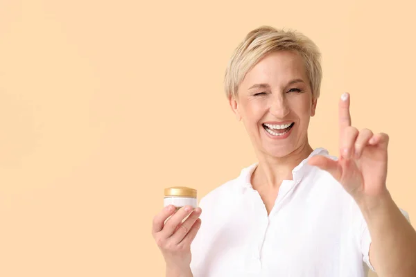 Mature Woman Jar Cream Beige Background — Stock Photo, Image