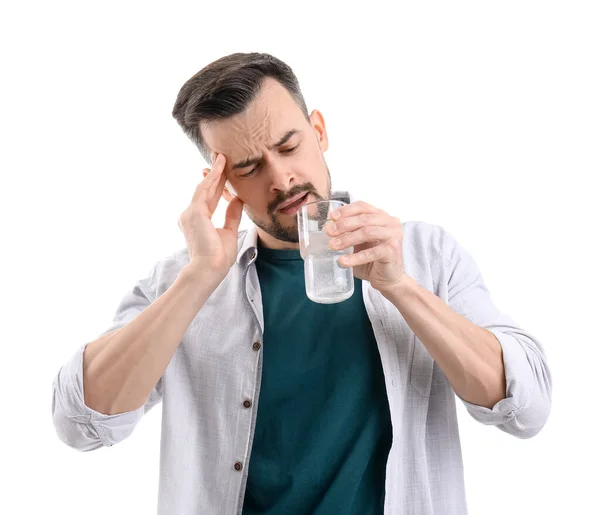 Hombre Joven Bebiendo Agua Con Tableta Disuelta Sobre Fondo Blanco — Foto de Stock