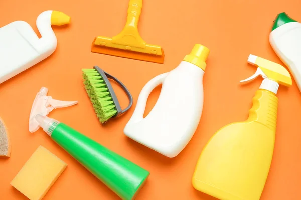Different Cleaning Supplies Orange Background — Stock Photo, Image