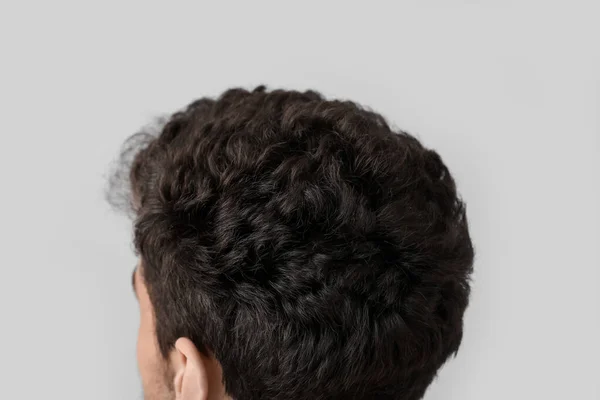 Young Brunette Man Stylish Hairdo Light Background Closeup — Stock Photo, Image