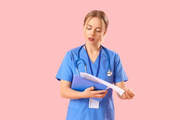 Female Medical Intern Clipboard Pink Background — Stock fotografie