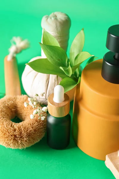 Bottles Cosmetic Products Brush Herbal Bag Gypsophila Flowers Green Background — Stock Photo, Image