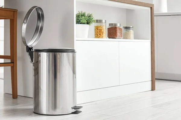 stock image Opened trash bin in interior of light kitchen