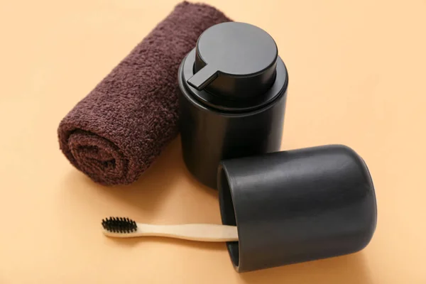 Holder Toothbrush Towel Bottle Cosmetic Product Color Background — Stock Photo, Image