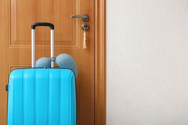 Blue Suitcase Travel Cushion Door Room Travel Concept — Stock Photo, Image