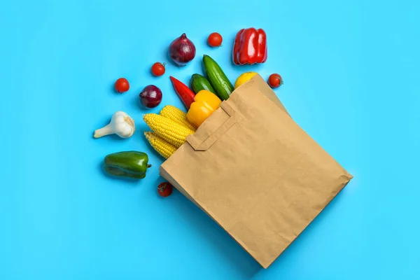 Paper Bag Fresh Vegetables Blue Background — Stock Photo, Image