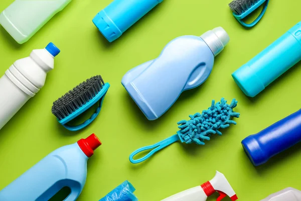 Many Different Cleaning Supplies Green Background — Stock Photo, Image