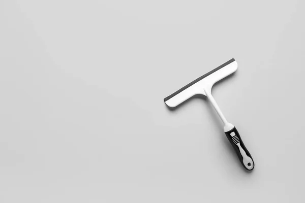 White Plastic Squeegee Grey Background — Stock Photo, Image