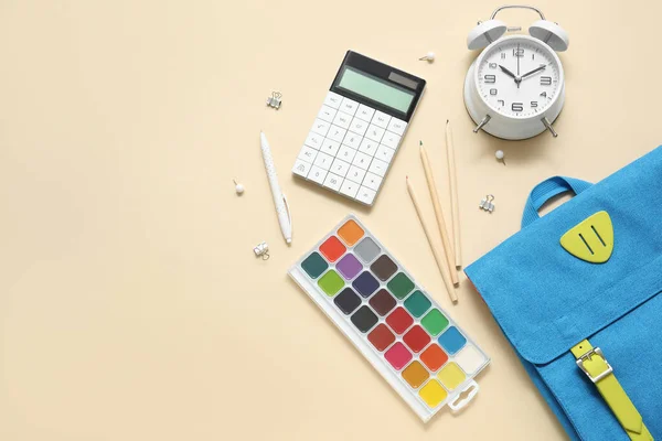 Blue School Backpack Alarm Clock Watercolors Calculator Beige Background — Stock Photo, Image
