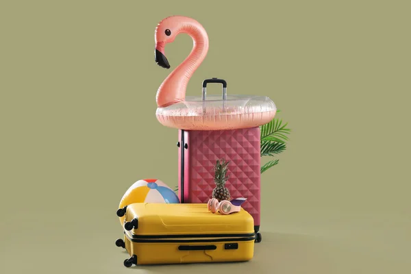 Suitcases Passport Inflatable Ring Shape Flamingo Headphones Green Background Travel — Stock Photo, Image