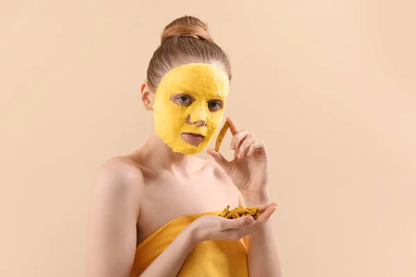 Young Woman Turmeric Sheet Mask Roots Beige Background Closeup — Stock Photo, Image