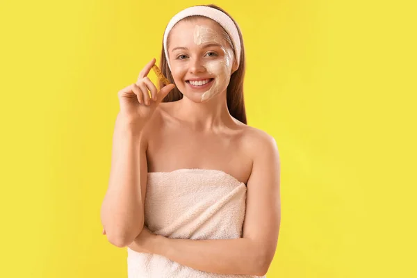 Young Woman Applied Turmeric Mask Root Yellow Background — Stock Photo, Image
