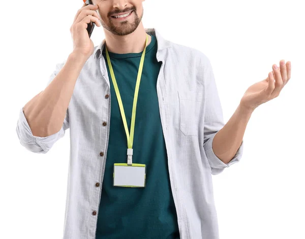 Молодой Человек Пустым Значком Говорит Мобильному Телефону Белом Фоне Крупным — стоковое фото