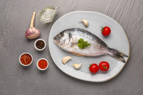 Plate Raw Dorado Fish Tomatoes Spices Grey Background — Stock Photo, Image