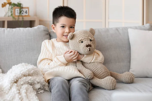 Cute Little Boy Knitted Sweater Toy Bear Sitting Sofa Home — Stock Photo, Image