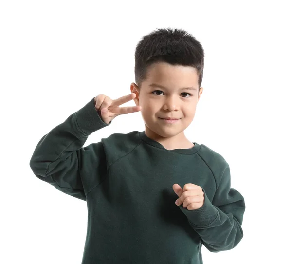 Cute Little Boy Knitted Sweater Showing Victory Gesture White Background — Stock Photo, Image
