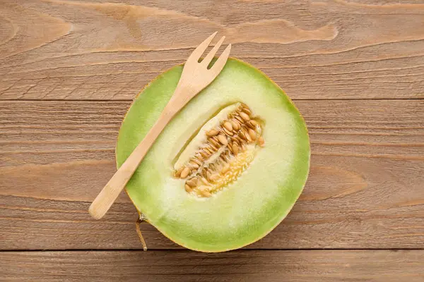 Half Sweet Melon Fork Wooden Background — Stock Photo, Image