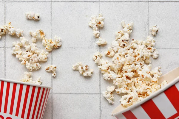 Buckets Tasty Popcorn White Tile Background — Stock Photo, Image