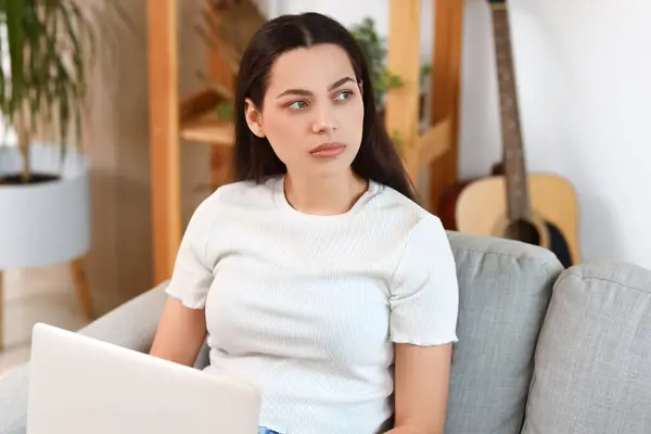 Thoughtful Young Woman Laptop Sofa Home — Stock Photo, Image