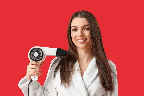 Beautiful Young Woman Hair Dryer Red Background — Stock Photo, Image