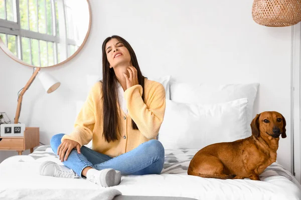 Allergic Young Woman Dachshund Dog Scratching Bedroom — Stock Photo, Image
