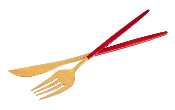 Beyaz Arka Planda Kırmızı Saplı Altın Çatal Bıçak — Stok fotoğraf