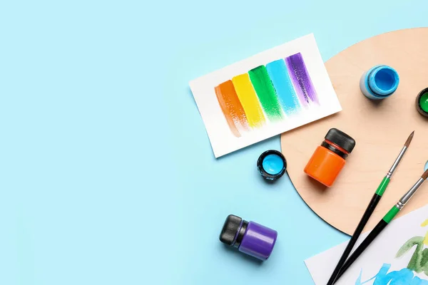Composition Different Paints Brushes Rainbow Color Palette Blue Background — Stock Photo, Image