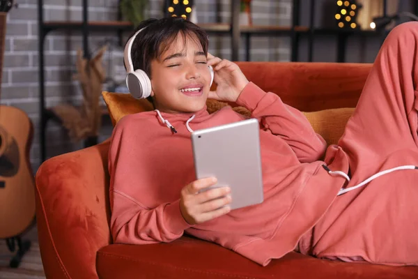 Little Boy Headphones Using Tablet Computer Home Late Evening — Stock Photo, Image