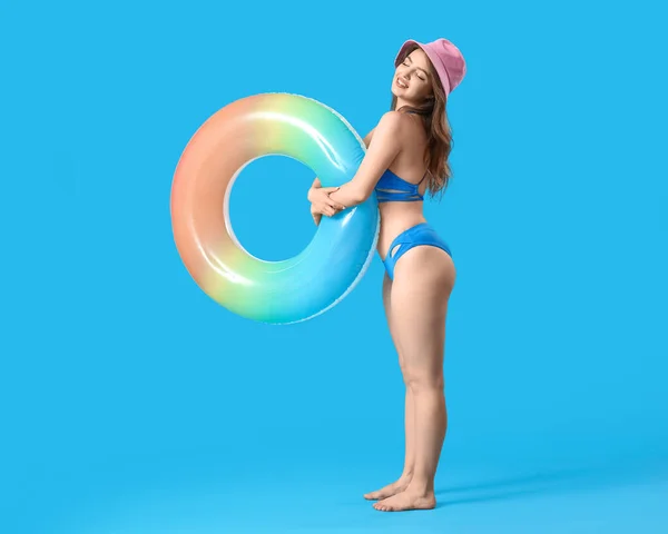Young Woman Swim Ring Blue Background — Stock Photo, Image