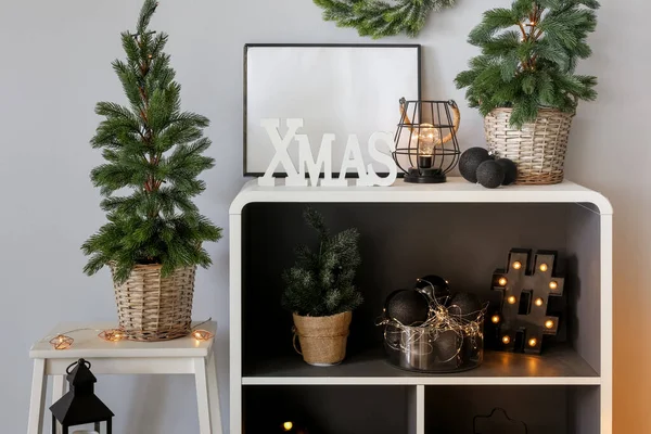 Shelving Unit Christmas Trees Glowing Lights Decor Room — Stock Photo, Image