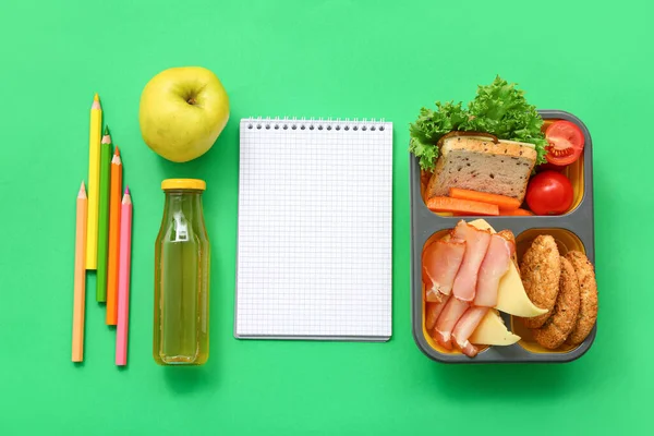 Stationery Blank Notebook Drink Lunch Box Tasty Food Green Background — Stock Photo, Image