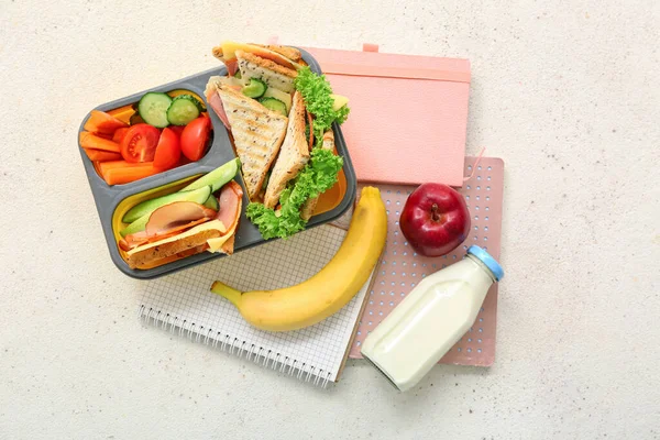 Notebooks Drink Lunch Box Tasty Food Grunge Light Background — Stock Photo, Image