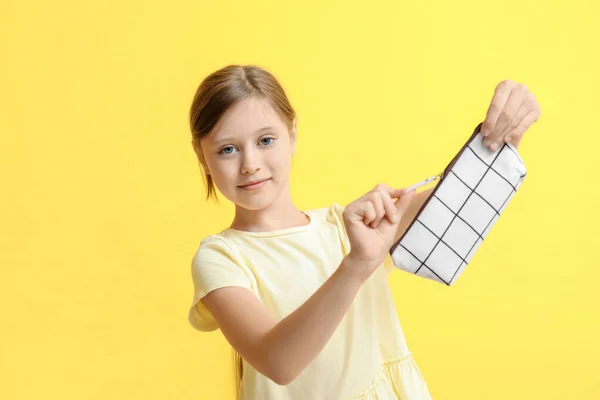 Little Girl Pencil Case Yellow Background — Stock Photo, Image