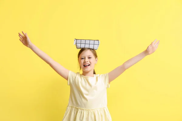 Little Girl Pencil Case Yellow Background — Stock Photo, Image