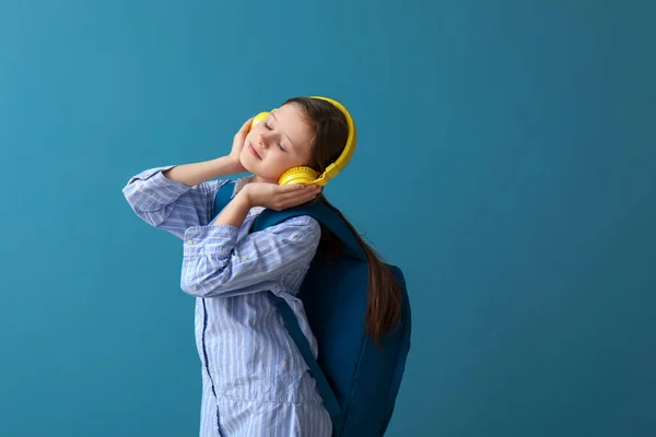 Little Schoolgirl Headphones Backpack Blue Background — Stock Photo, Image