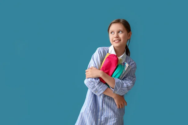 Little Schoolgirl Pencil Cases Blue Background — Stock Photo, Image