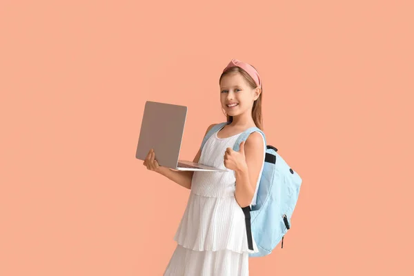 Little Schoolgirl Laptop Backpack Showing Thumb Pink Background — Stock Photo, Image