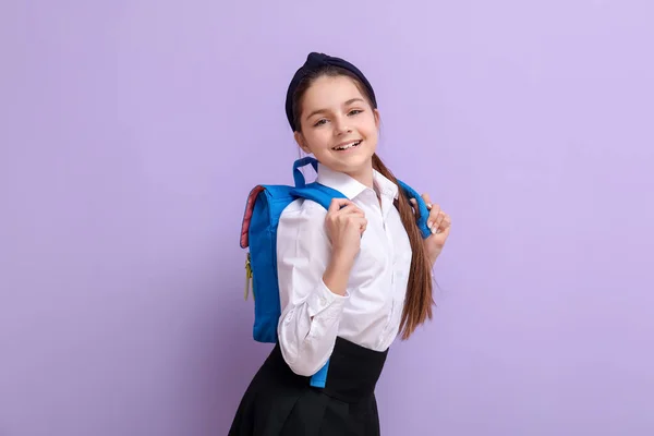 Little Schoolgirl Backpack Lilac Background — Stock Photo, Image